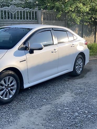 coroll: Toyota Corolla: 2019 г., 1.8 л, Вариатор, Гибрид, Седан — 2