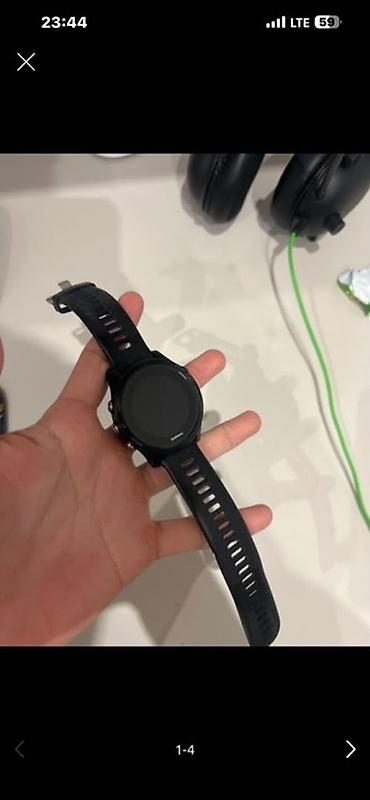 Garmin: Спортивные смарт‑часы Garmin (черные) - Круглый дисплей, три боковые — 2