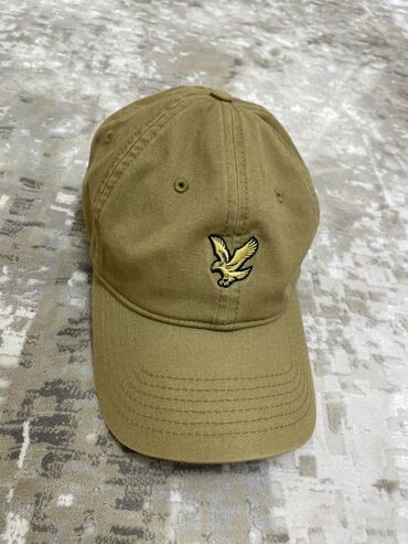 Шапки: Бейсболка Lyle & Scott песочного цвета с вышитым золотым орлом