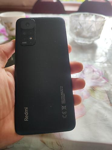 redmi 11: Xiaomi Redmi smartfon - Model: Redmi (arxa qapaqda “Redmi” loqosu) — 2
