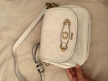 Çantalar: Guess canta original. Yaxsi veziyyetdedi
Az islenib — 3