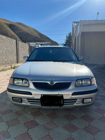 будка машина: Mazda 626: 1999 г., 2 л, Механика, Газ, Универсал