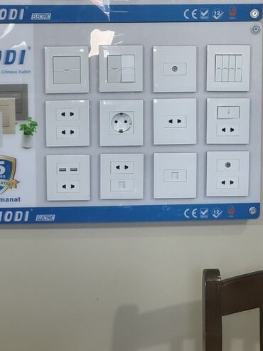 Лампочки: Bu kolleksiyada müxtəlif növ elektrik açarları və rozetkalar təqdim