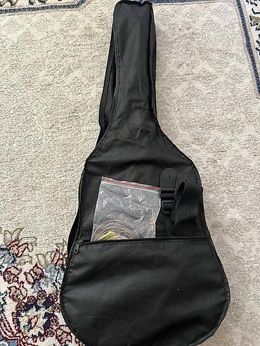 Гитары: Акустическая гитара с вырезом (cutaway) формата дредноут — 4