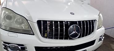 mersedes salon: Mercedes-Benz ML sinfi SUV Xüsusiyyətlər: - Kuzov: ağ rəng, 5 qapılı — 10