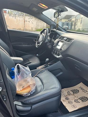 mini kia: Kia Pride: 1.4 l | 2015 il Sedan — 9
