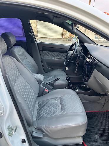 daewoo gentra oluxanasi: DAYVO GENTRA Xüsusiyyətlər: - Kuzov: ağ rəngli sedan, tünd bənövşəyi — 7