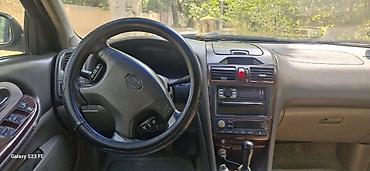 рул: Nissan Maxima: 2002 г., 3 л, Кол менен иштөөчү, Бензин, Седан — 6