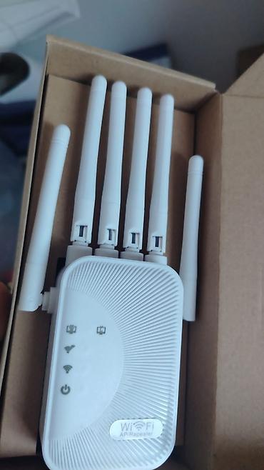 100 manatliq plansetler: Wifi erazi guclendirici wifi zeif catdigi yerlere rahatligla internet — 4