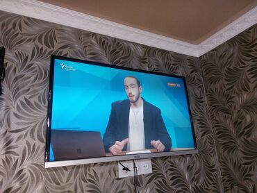 yasin телевизор пульт скачать: Телевизор с плоским экраном, установленный на стене, предлагает