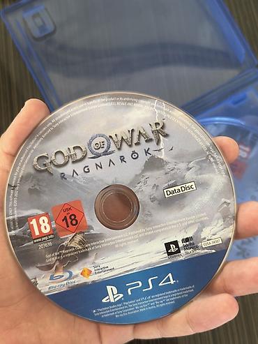 Video oyunlar və konsollar: PS4 üçün **God of War Ragnarök** oyun diski. Diskin üzərində **Data — 2