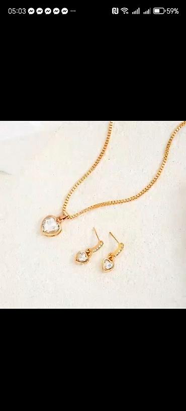 Setovi nakita: Komplet nakita – zlatna boja, motiv srca Sadrži: - Ogrlicu sa — 7