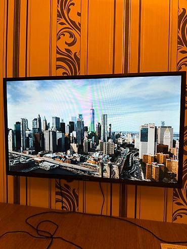asılqan satışı: Smart televizor, 82 diaqonal, az işlənmişdir, qutusu üstündədir — 1