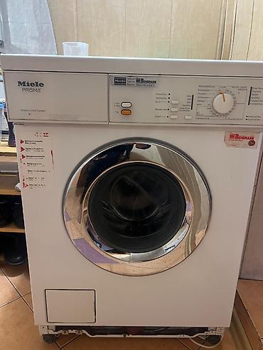 умный автомат: Стиральная машина Miele PRISMA (фронтальная загрузка). - Серия — 1