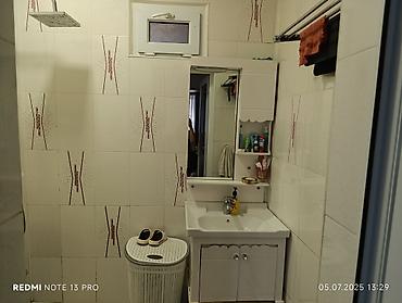 Ev üçün digər mebel: Mətbəx: - Künc tipli, krem rəngli parlaq fasadlı modul mətbəx mebeli - — 1