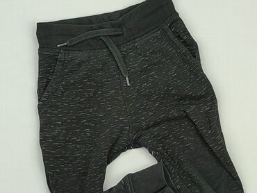 czarne legginsy z eko skóry: Spodnie dresowe, 12-18 m, stan - Dobry