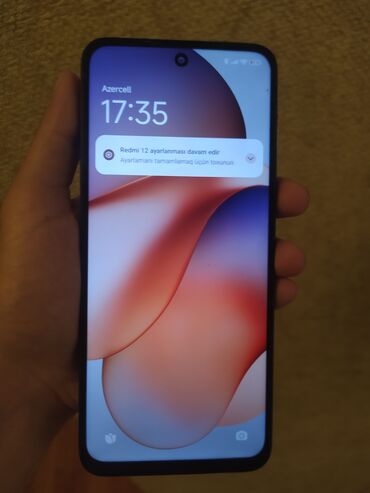 açılıb bağlanan telefon: Xiaomi 12, 128 GB, rəng - Qara, 
 Sensor, İki sim kartlı, Face ID