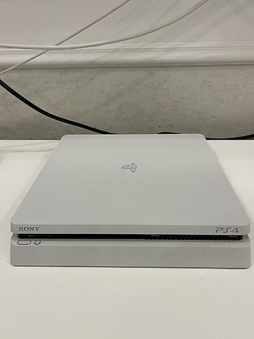 ps4 slim disk: Sony PlayStation 4 Slim – Ağ rəng Xüsusiyyətlər: - Model: PS4 Slim - — 1