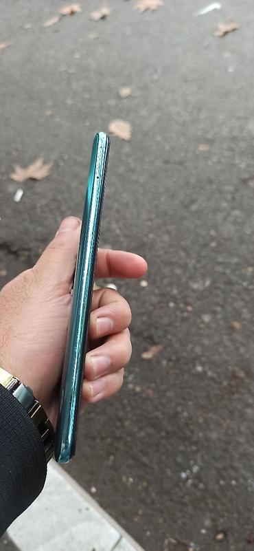 en yaxsi modem hansidir: Xiaomi 128 GB, rəng - Yaşıl, 
 Barmaq izi — 7