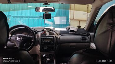 Mazda: Mazda 323: 2002 г., 1.6 л, Механика, Бензин, Хэтчбэк