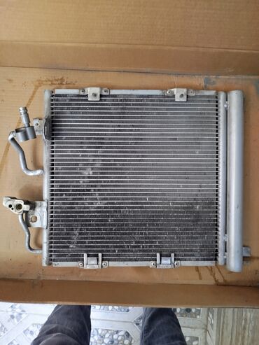Opel: Salam öz 1.4 benzin Opelimin üstündən çıxarmışam öz radiatoru olmadığı