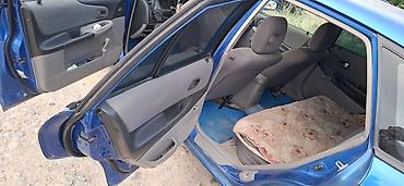 mazda 323 (bh): Mazda 323: 2002 г., 1.8 л, Механика, Бензин, Хэтчбэк — 7