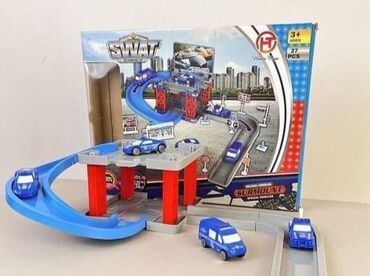 коляски анекс бу: •SWAT temalı yol və parkinq oyuncaq seti – 27 hissə •YAŞ QRUPUYaş