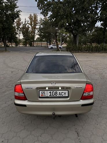 Mazda: Mazda 323: 1998 г., 1.5 л, Механика, Бензин, Седан — 17