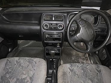 Унаа: Toyota Duet: 2000 г., 1 л, Автомат, Бензин, Лифтбек — 5