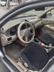 Nissan: Nissan Sunny: 1.3 l | 2006 il Sedan — 7