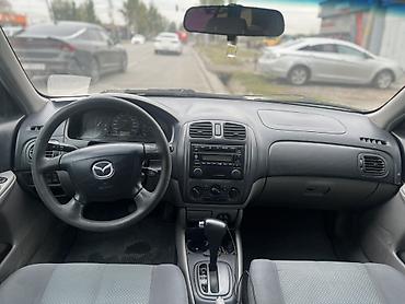 Унаа: Mazda Familia: 2002 г., 1.6 л, Автомат, Бензин, Универсал — 3
