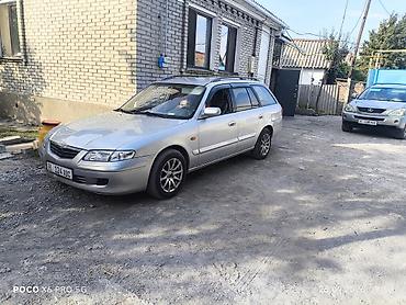 синбей групп: Mazda Capella: 2001 г., 2 л, Механика, Бензин, Универсал — 3