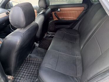 Daewoo: Daewoo Gentra: 1.5 l | 2014 il Sedan — 6