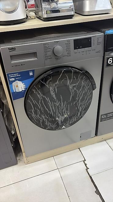 mini 6: Beko paltaryuyan maşın – ön yükləməli, gümüşü korpus, geniş qapı — 1