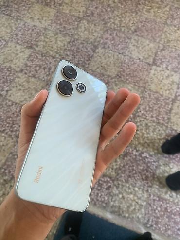 Мобильные телефоны и аксессуары: Redmi 13, 256 ГБ, цвет - Голубой — 2