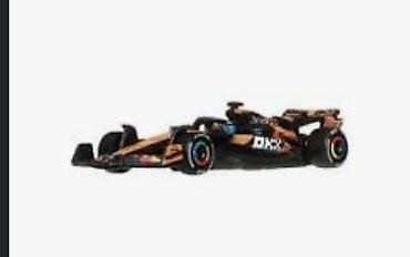 Автоунаалардын моделдери: Коллекционная модель болида Формулы‑1 McLaren (раскраска с логотипами — 1