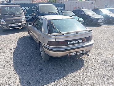 бампер сди: Mazda 323: 1990 г., Механика, Седан — 3