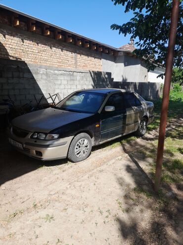 пускатель для аккумулятора автомобиля: Mazda 626: 1997 г., 2 л, Автомат, Бензин, Седан