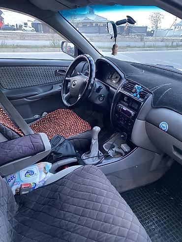 mini coper: Mazda 626: 1999 г., 1.8 л, Механика, Бензин, Седан — 2
