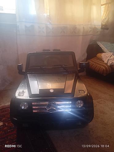 Uşaq üçün elektrikli minik maşını – Mercedes G-Class üslubunda, qara
