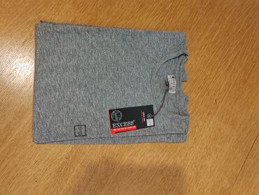 Majice: Muske nove majce. Dobijene na poklon. Velicina XXL. Svaka je po 500 na lalafo.rs — 2 Majice: Muske nove majce. Dobijene na poklon. Velicina XXL. Svaka je po 500 — 2