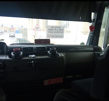 mercedes 208 d: MAN TGX dartqı avtomobili və tentli yarımqoşqu - Markа/model: MAN TGX — 1