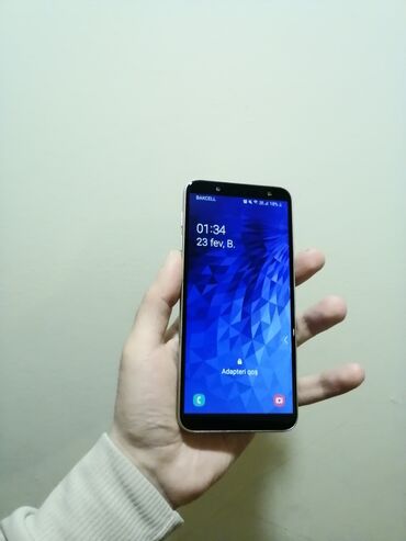 Samsung: Samsung Galaxy J6, 32 GB, rəng - Gümüşü, Sensor, Barmaq izi, Simsiz şarj