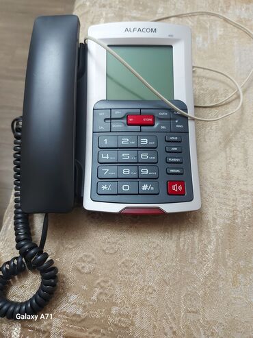 Stasionar telefon Simli