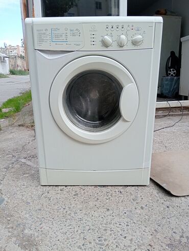 paltaryuyan masinlar: Indesit önyükləməli paltaryuyan maşın - Ön paneldə mexaniki