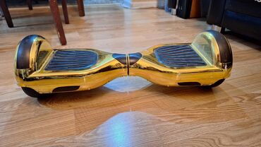 купить электросамокат в баку: Qızılı rəngli 2 təkərli hoverboard (self-balance scooter) və dəmirdən