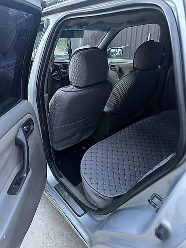 07 oturacaqlar: Nissan Primera Wagon – gümüş rəng, universal kuzov Xüsusiyyətlər: - — 8