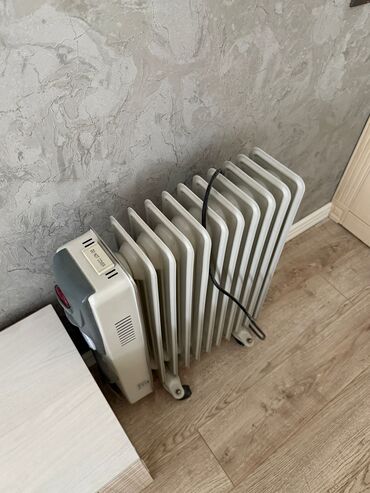 radiatır: Portativ yağlı radiator, effektiv istilik təmin edən və otaqlarınızı