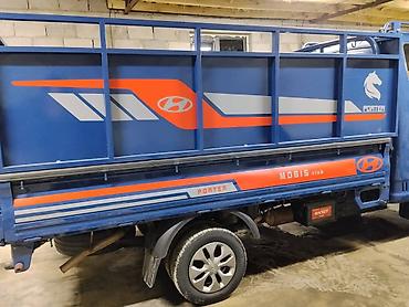 Изготовление рекламных конструкций: Наклейки на портер на заказ г.Ош — 11