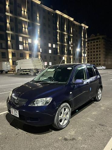 рул: Mazda Demio: 2002 г., 1.3 л, Автомат, Бензин, Хетчбек — 2